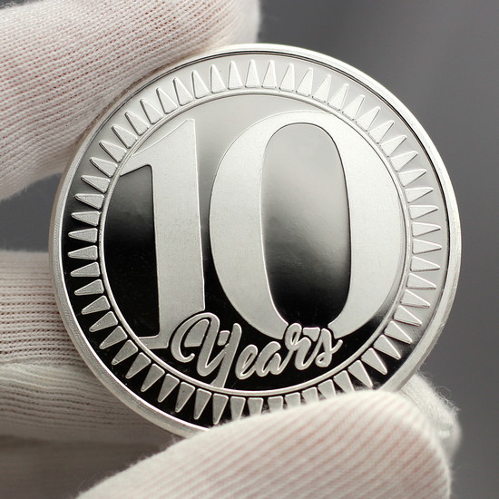 10 Years/Anniversary 1oz .999 Silver Round Close up of Design
