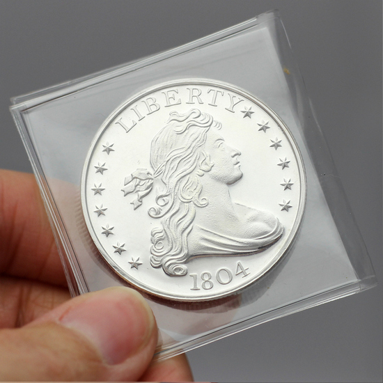 1804 Dollar Replica 1oz .999 Silver Medallion Hand Holding Image 1804 Dollar Replica 1oz .999 Silver Medallion Hand Holding Image
