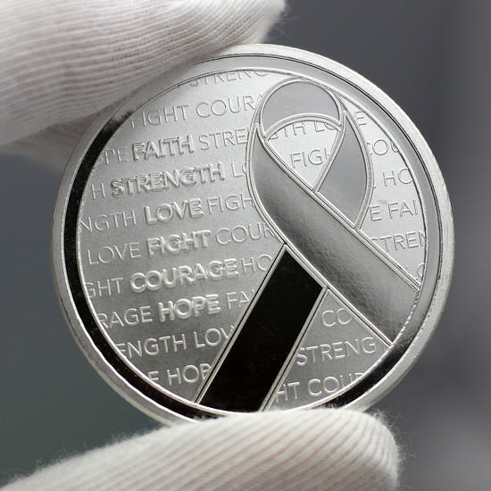 Awareness Ribbon Silver Round Hand Photo Showing Reflective Qualities