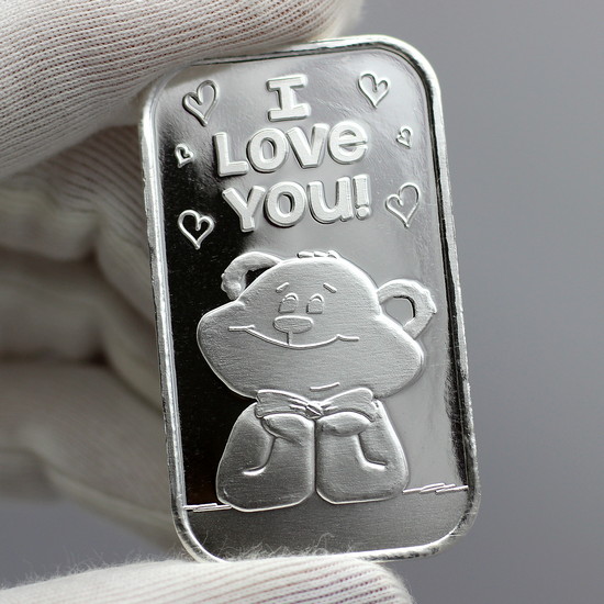 Close Up Reflective View of I Love You Daydreaming Teddy Bear Silver Bar Minted by SilverTowne
